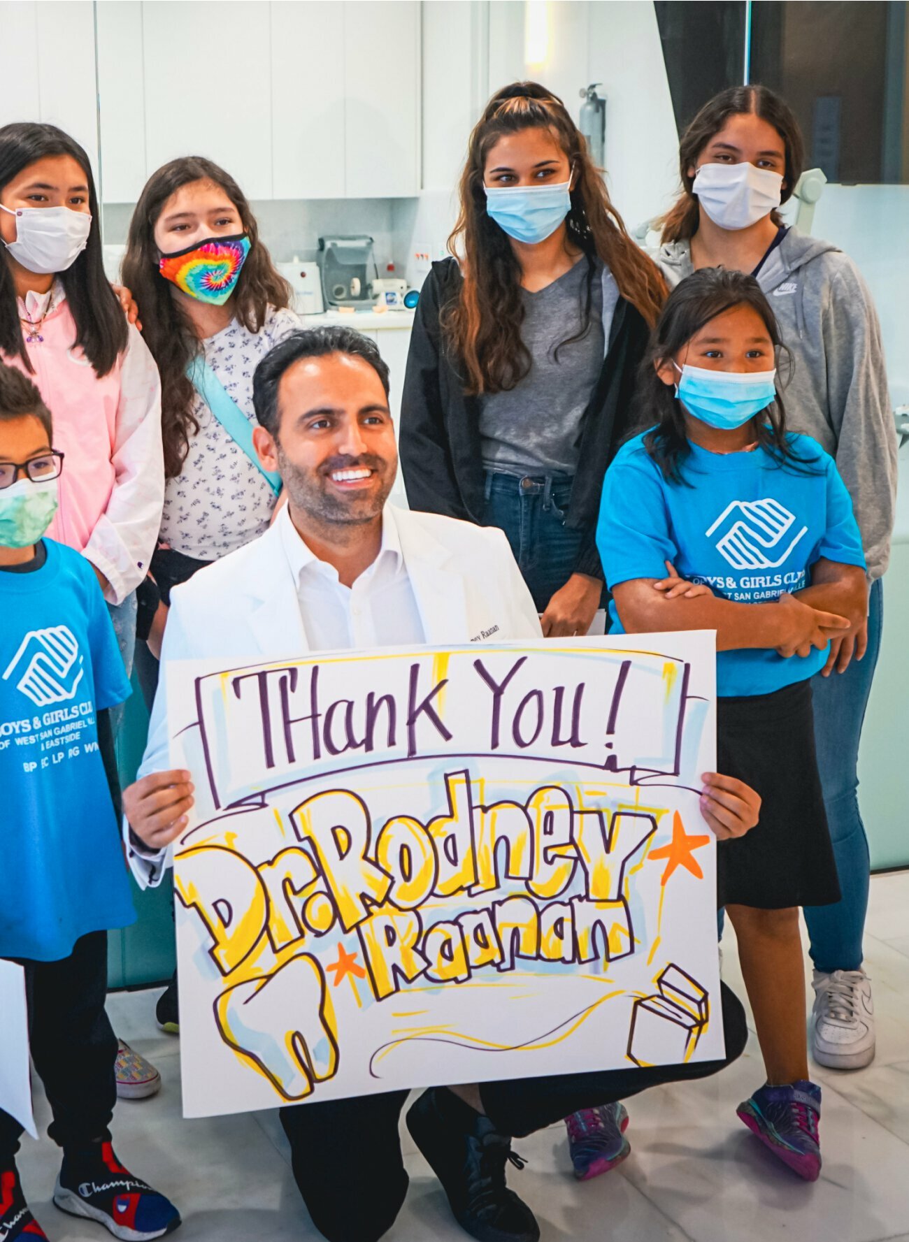 Beverly Hills Cosmetic Dentist Dr Raanan in group shot with child patients